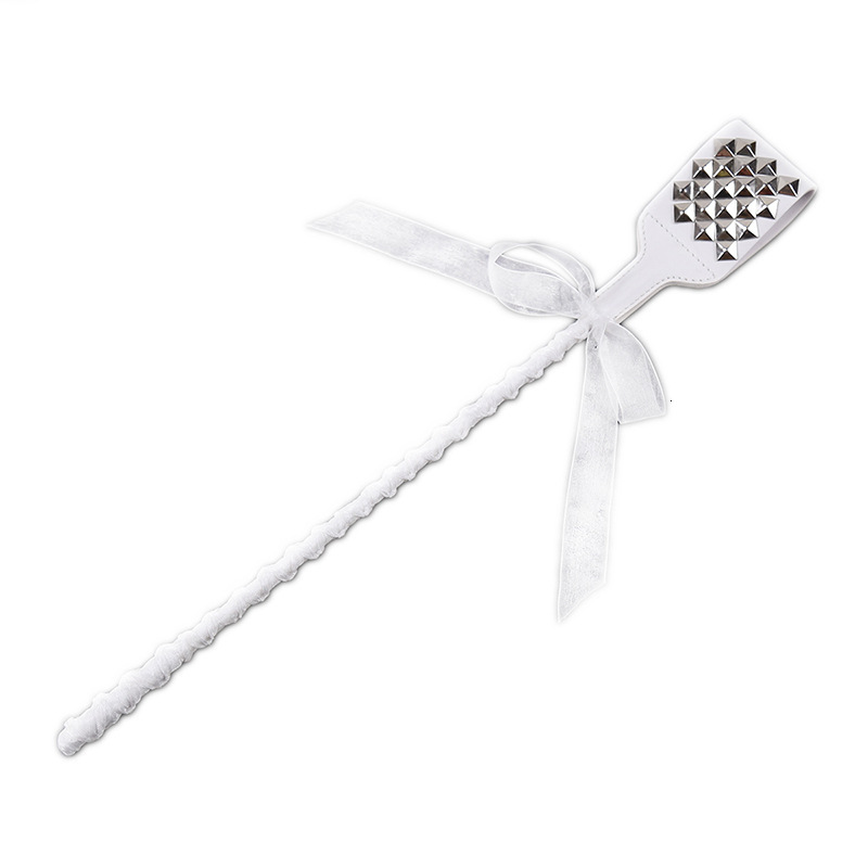 Foreign trade manufacturer adult sex toy white rivet spanking buttocks toy nightclub tuning bow leather patting