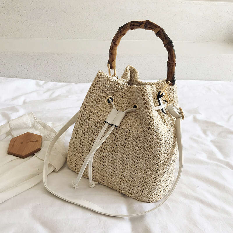 2025 New Handheld Straw Woven Summer Korean Edition Fashion Single Shoulder Crossbody Bamboo Bucket Women's Bag