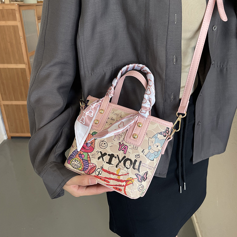2024 Autumn New Handbag Women's Cartoon Bear Graffiti Bucket Texture Fashion Single Shoulder Crossbody Bag