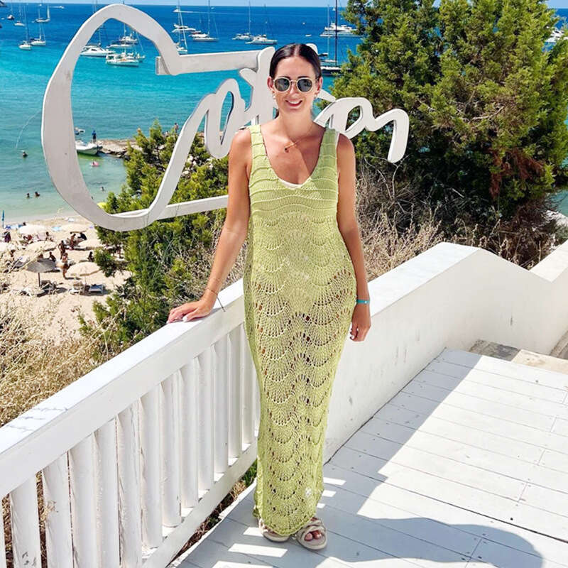 European and American knitted hollow low cut solid color slim fit sexy beach dress women's 2024 new casual versatile fashion clothing