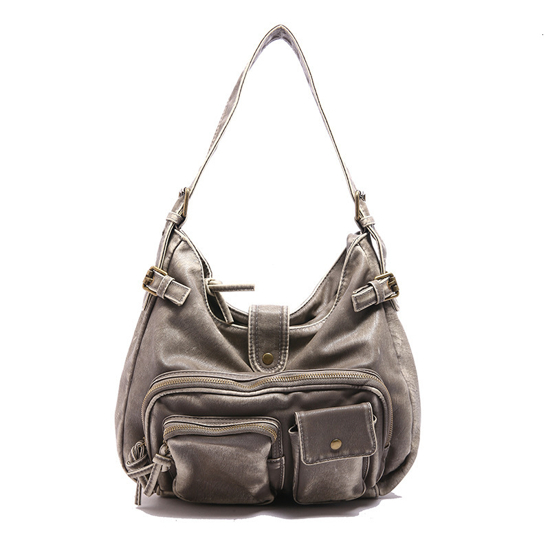 High end handbag, women's multi pocket motorcycle punk style niche shoulder bag, crossbody bag