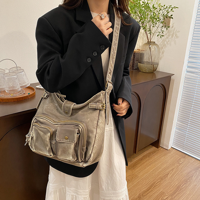 High end handbag, women's multi pocket motorcycle punk style niche shoulder bag, crossbody bag