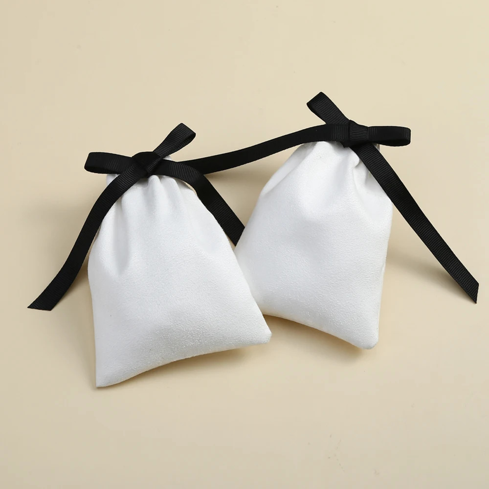 50 pieces of white jewelry packaging with black ribbon velvet drawstring bag used for makeup wedding party bags and small flannel gift bags 241206