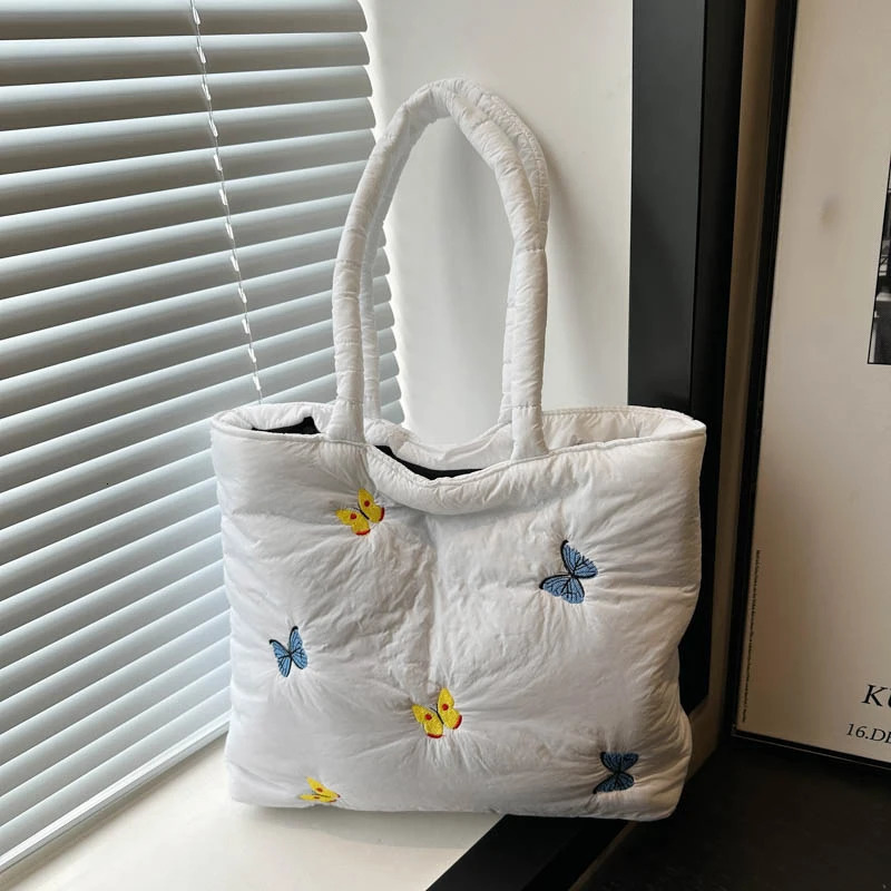 Butterfly shoulder bag large capacity handbag womens commuting leisure down cotton pad lower arm shoulder 241205
