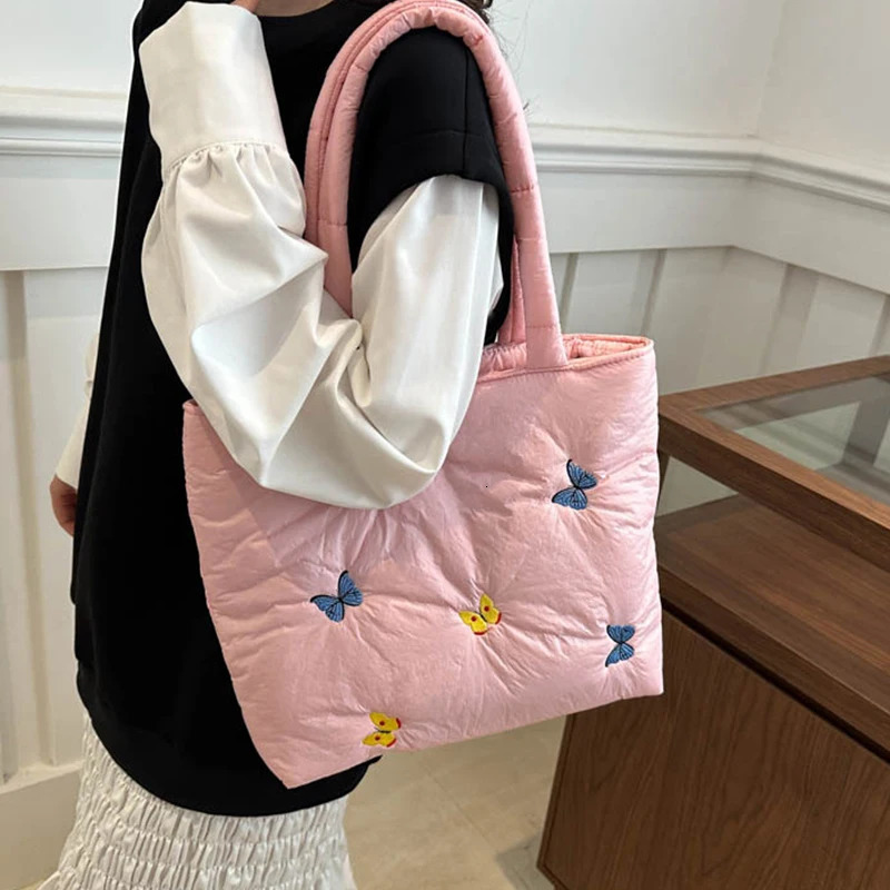 Butterfly shoulder bag large capacity handbag womens commuting leisure down cotton pad lower arm shoulder 241205