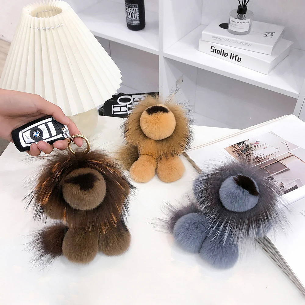 Plush real Rex rabbit fur keychain cute toy lion handbag pendant charm pavilion womens car keyring decoration childrens birthday gift 241206