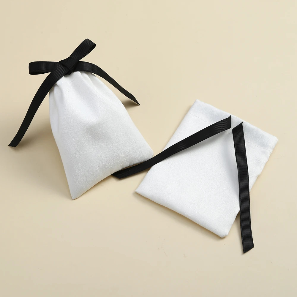 50 pieces of white jewelry packaging with black ribbon velvet drawstring bag used for makeup wedding party bags and small flannel gift bags 241206