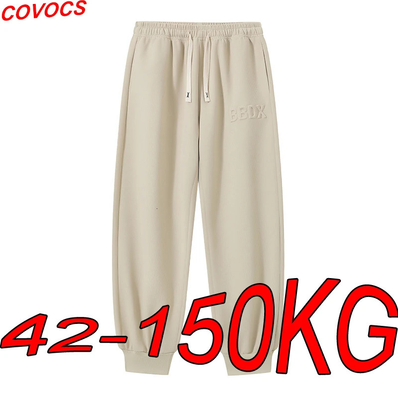 Mens plus size solid color sports pants 8XL oversized high waisted loose casual 241206