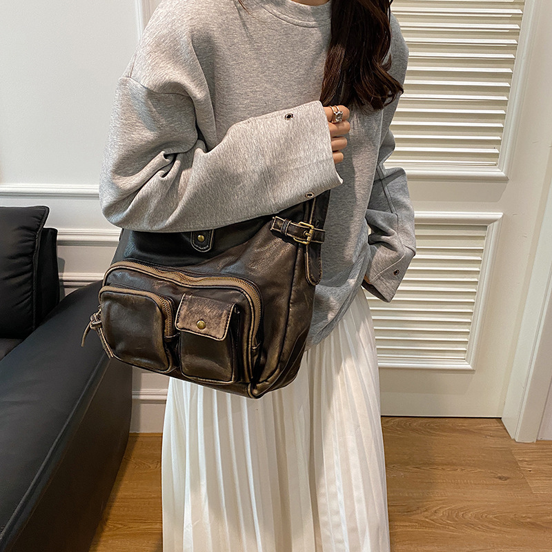 High end handbag, women's multi pocket motorcycle punk style niche shoulder bag, crossbody bag