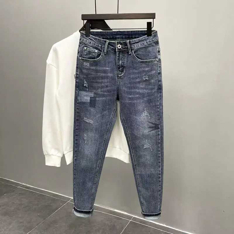 High Quality Newly arrived fashionable mens jeans with spliced cat whiskers torn and scratched luxurious clothing ultrathin fit tapered legs designer 