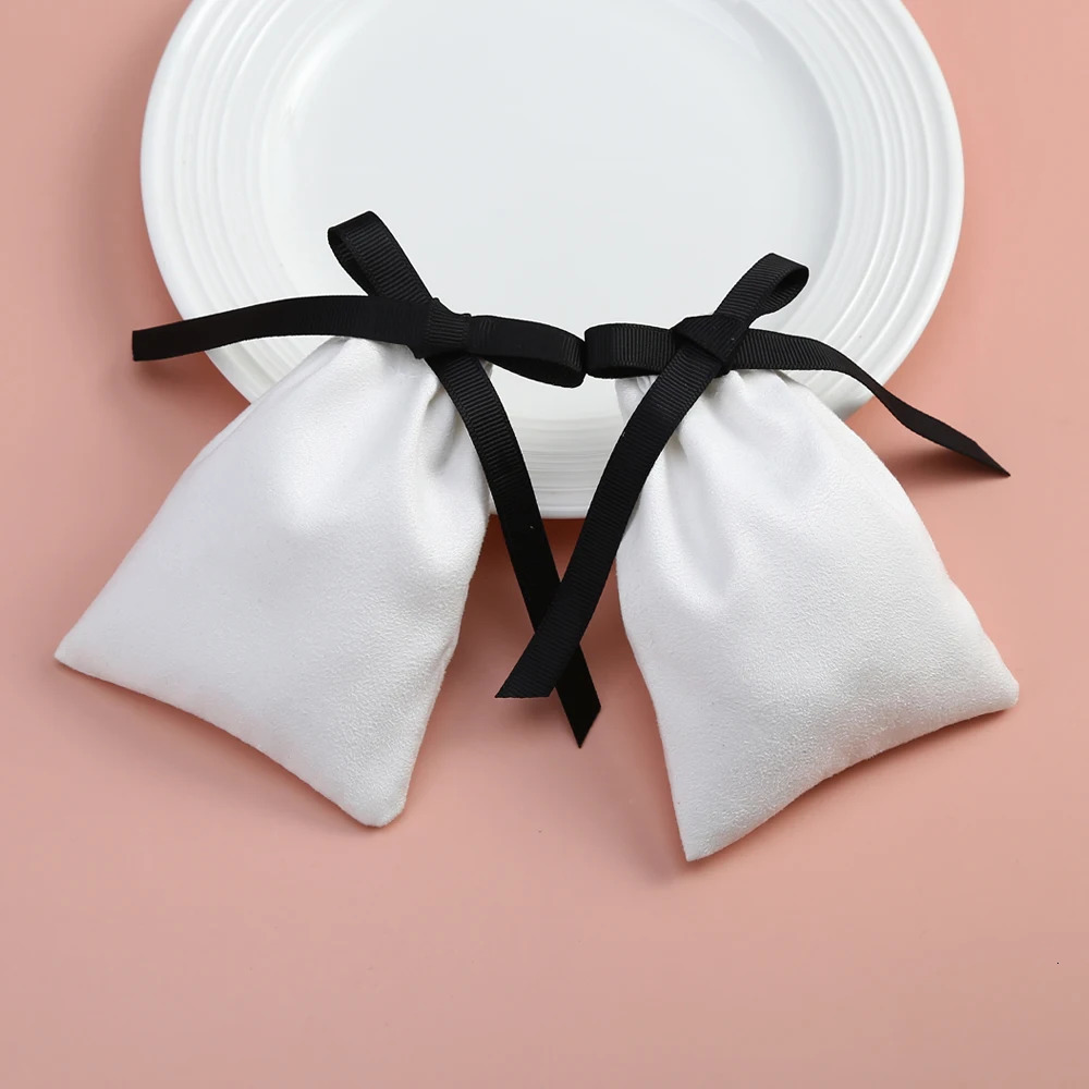50 pieces of white jewelry packaging with black ribbon velvet drawstring bag used for makeup wedding party bags and small flannel gift bags 241206