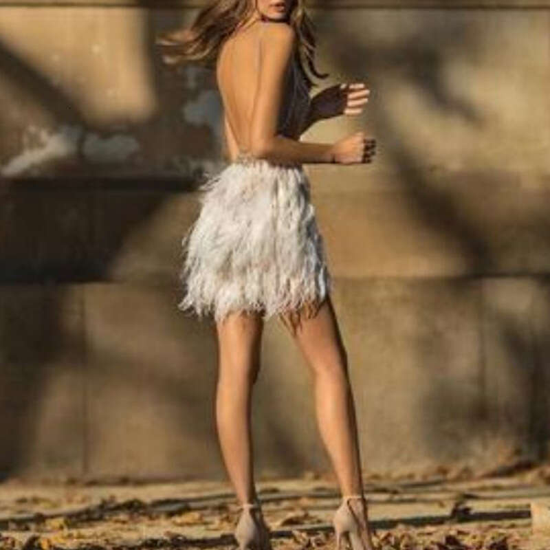 INS autumn winter European and American suspender V-neck feather sexy women's banquet evening dress 2024 temperament versatile new trendy clothin