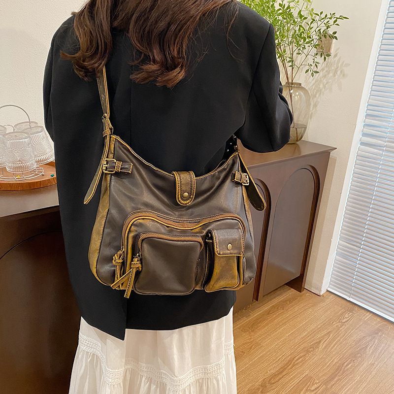 High end handbag, women's multi pocket motorcycle punk style niche shoulder bag, crossbody bag