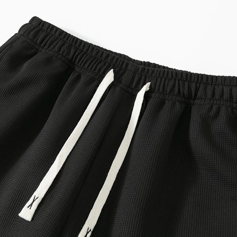 Mens plus size solid color sports pants 8XL oversized high waisted loose casual 241206