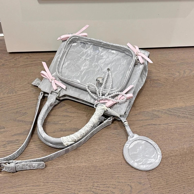 Vintage chic bow transparent zipper Ita bag Sweet Y2k fashionable cute shoulder bag fashionable luxurious womens shoulder bag 241205