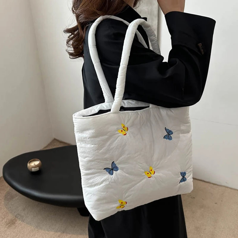 Butterfly shoulder bag large capacity handbag womens commuting leisure down cotton pad lower arm shoulder 241205