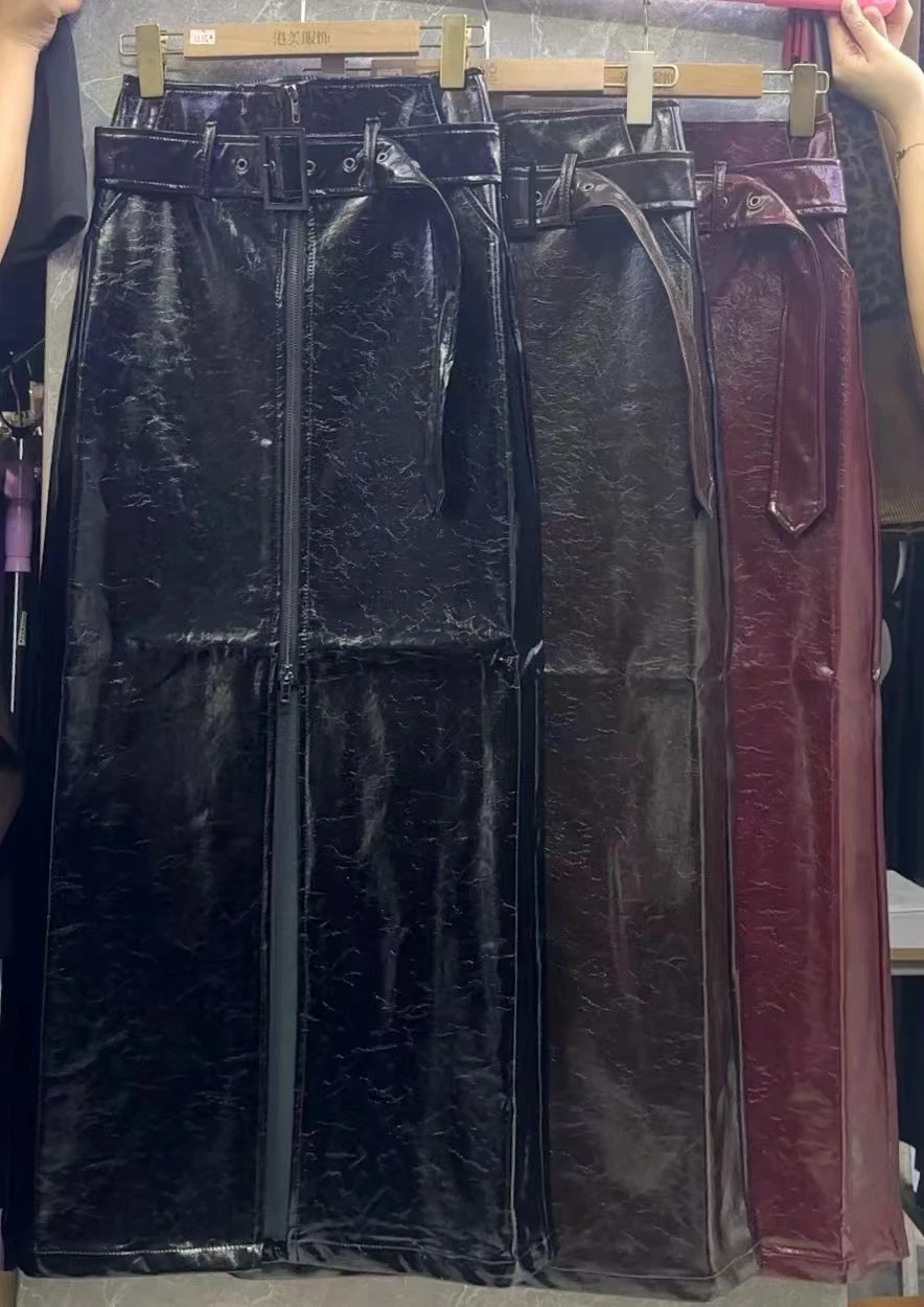 High waisted solid color soft leather autumn and winter PU leather skirt with belt suitable for womens skiing Midi dress 241205