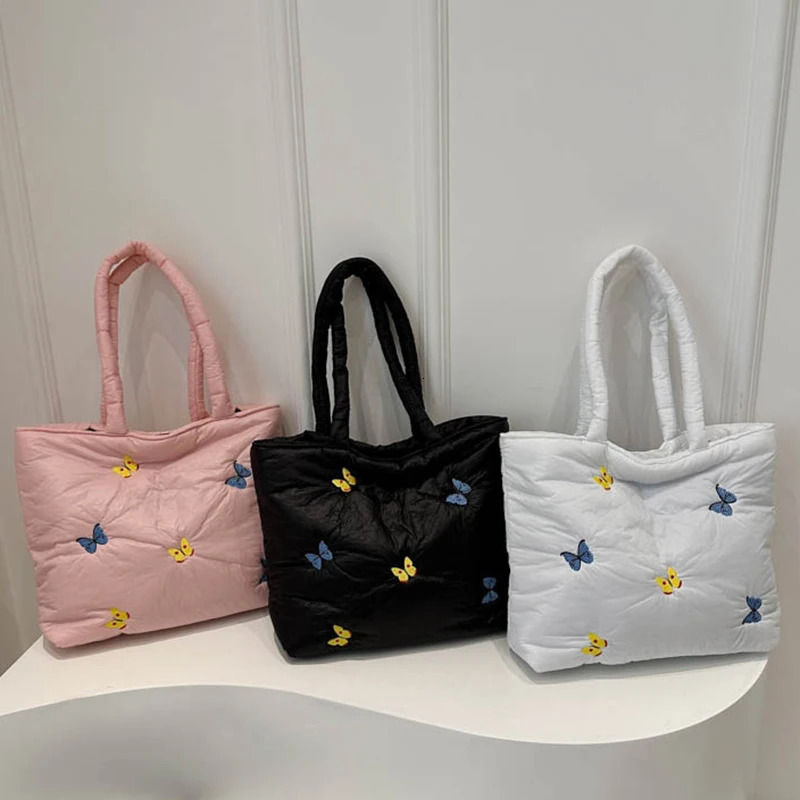 Butterfly shoulder bag large capacity handbag womens commuting leisure down cotton pad lower arm shoulder 241205