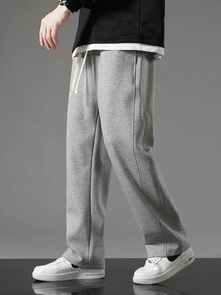 Spring and autumn mens sportswear Korean fashion Drawstring wide leg straight track pants cotton casual loose 241206