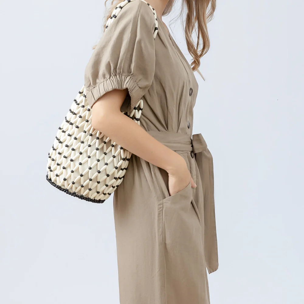 Women Woven hand bag summer n hollowout wooden bead tote bucket shoulder female Reticulate netted canvas beach handbag 241203