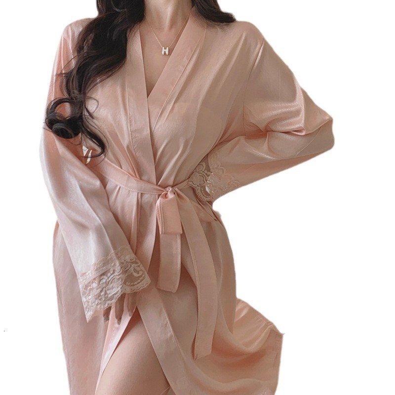 2025 Designer's new pink Pure Desire trench coat women's summer lace sexy fashion V-neck spring and autumn sleep long sleeved short skirt th