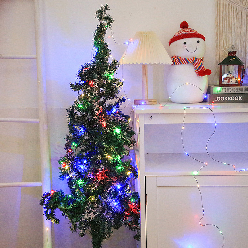 Christmas tree green wire copper wire lights string star lights coloured lights string full of stars greenery rattan garland decoration