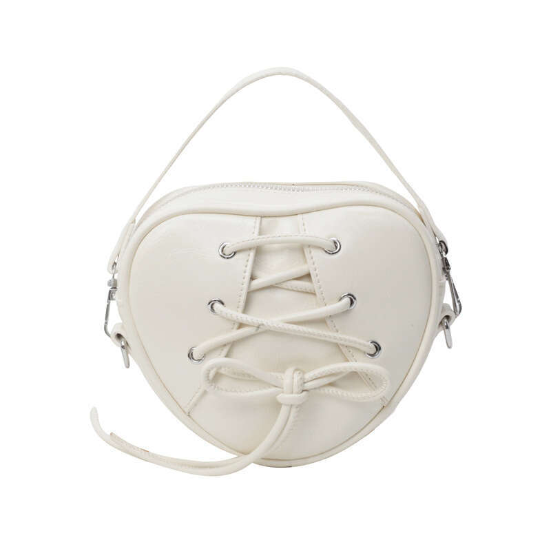 High appearance niche design girl's heart ballet single shoulder crossbody bag, bow tie strap, heart-shaped handbag