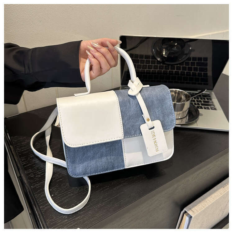Niche design color blocking splicing hand-held small square 2023 new texture crossbody fashion shoulder bag