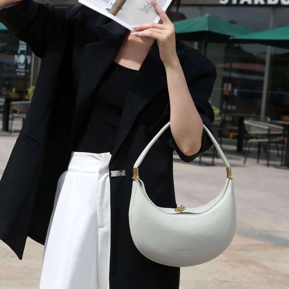 Advanced crescent armpit bag, pine moon series, versatile commuting handbag, designer's new autumn and winter women's bag