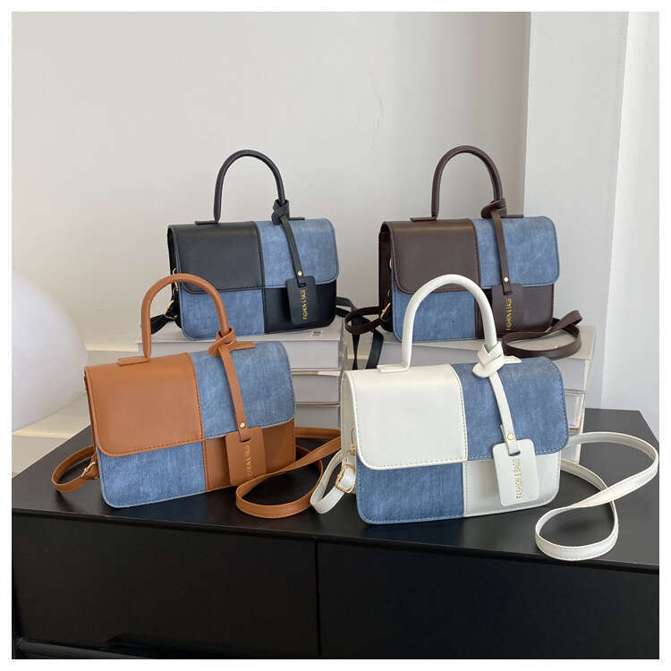 Niche design color blocking splicing hand-held small square 2023 new texture crossbody fashion shoulder bag
