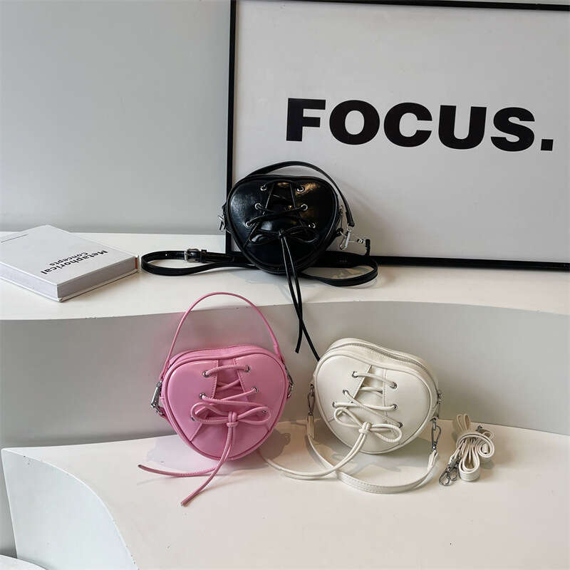 High appearance niche design girl's heart ballet single shoulder crossbody bag, bow tie strap, heart-shaped handbag
