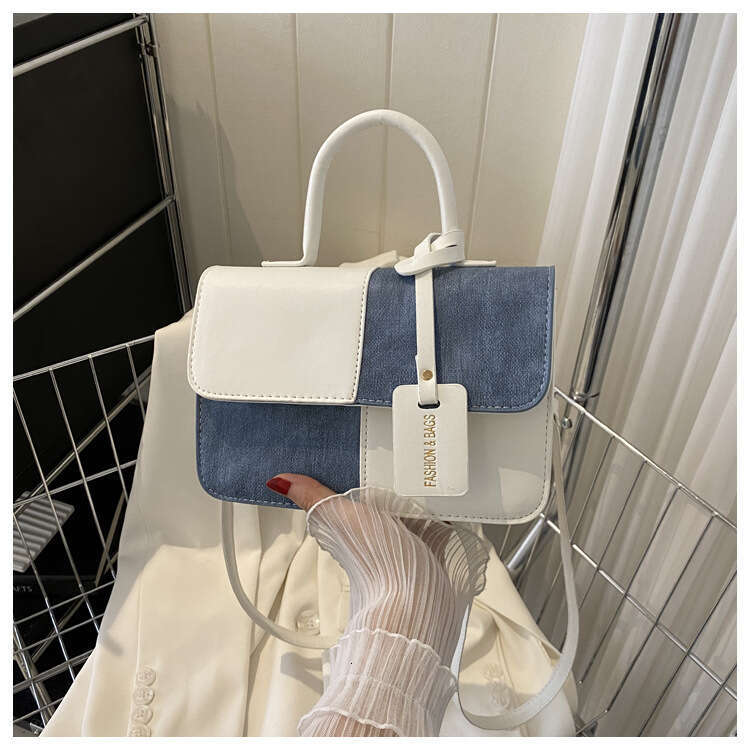 Niche design color blocking splicing hand-held small square 2023 new texture crossbody fashion shoulder bag