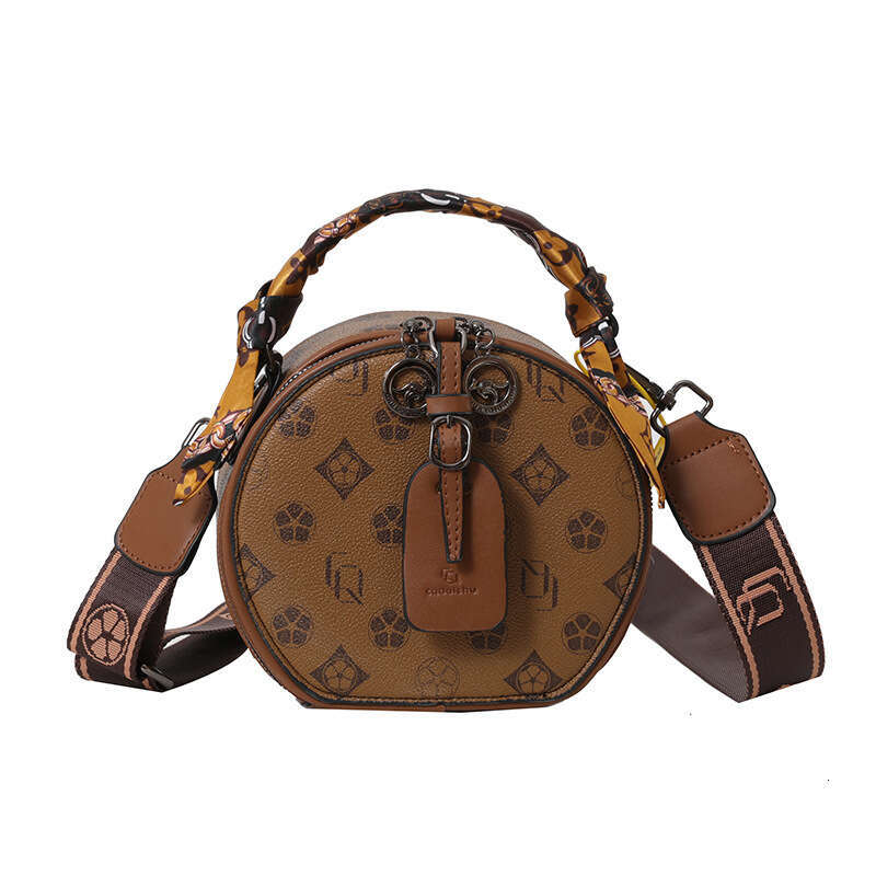 Round 2024 new high-end single shoulder French niche small crossbody biscuit bag for women