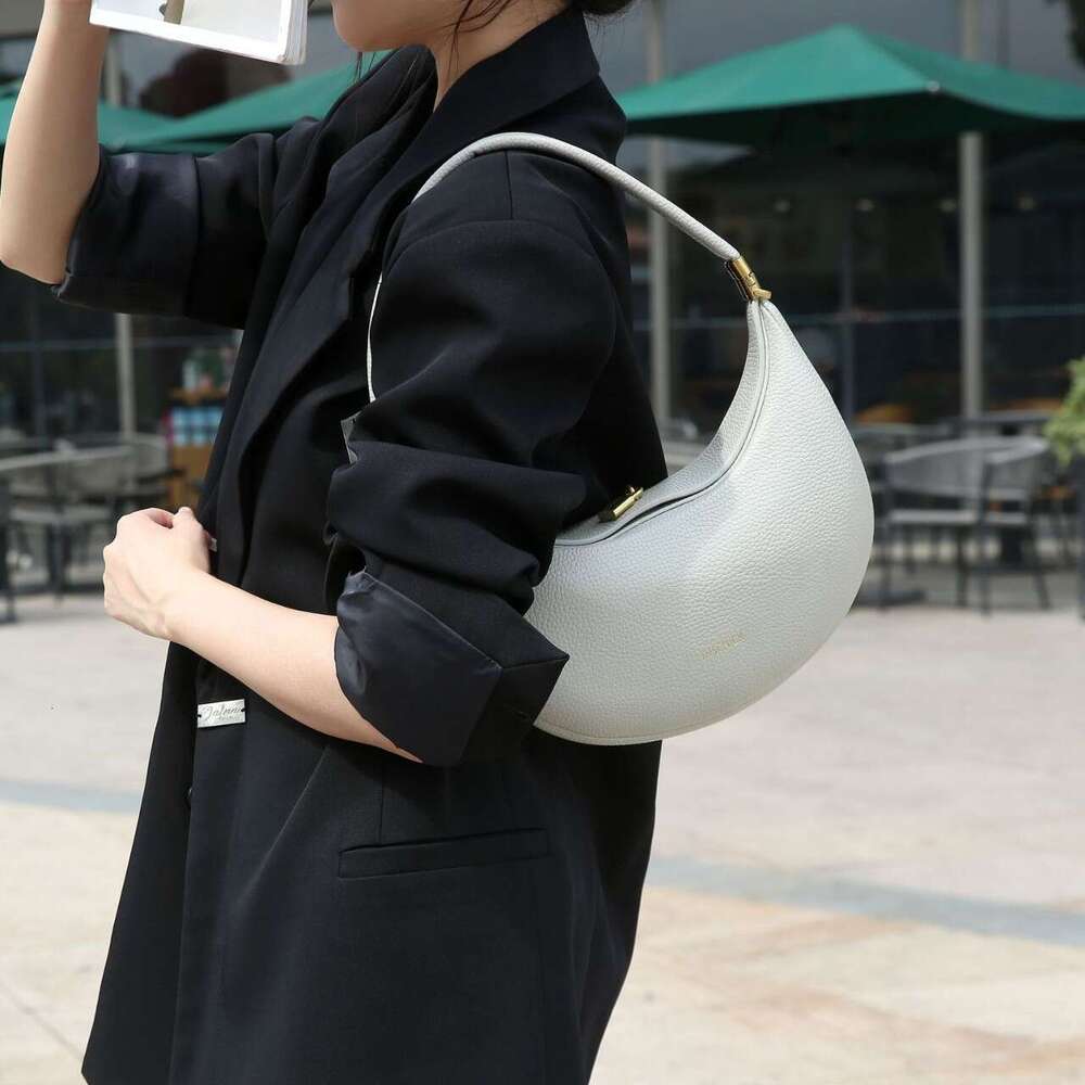 Advanced crescent armpit bag, pine moon series, versatile commuting handbag, designer's new autumn and winter women's bag