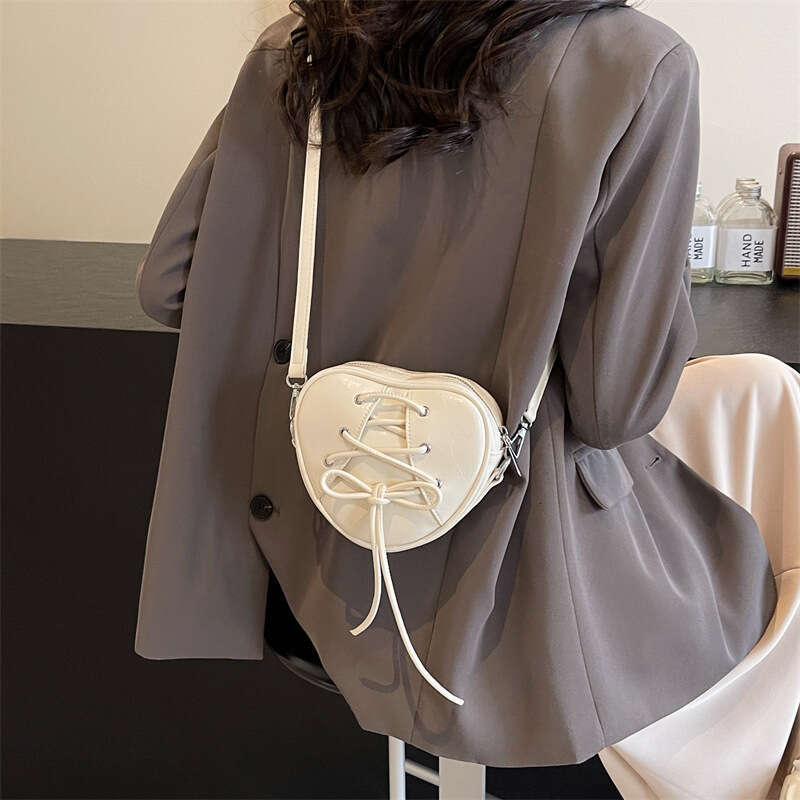 High appearance niche design girl's heart ballet single shoulder crossbody bag, bow tie strap, heart-shaped handbag