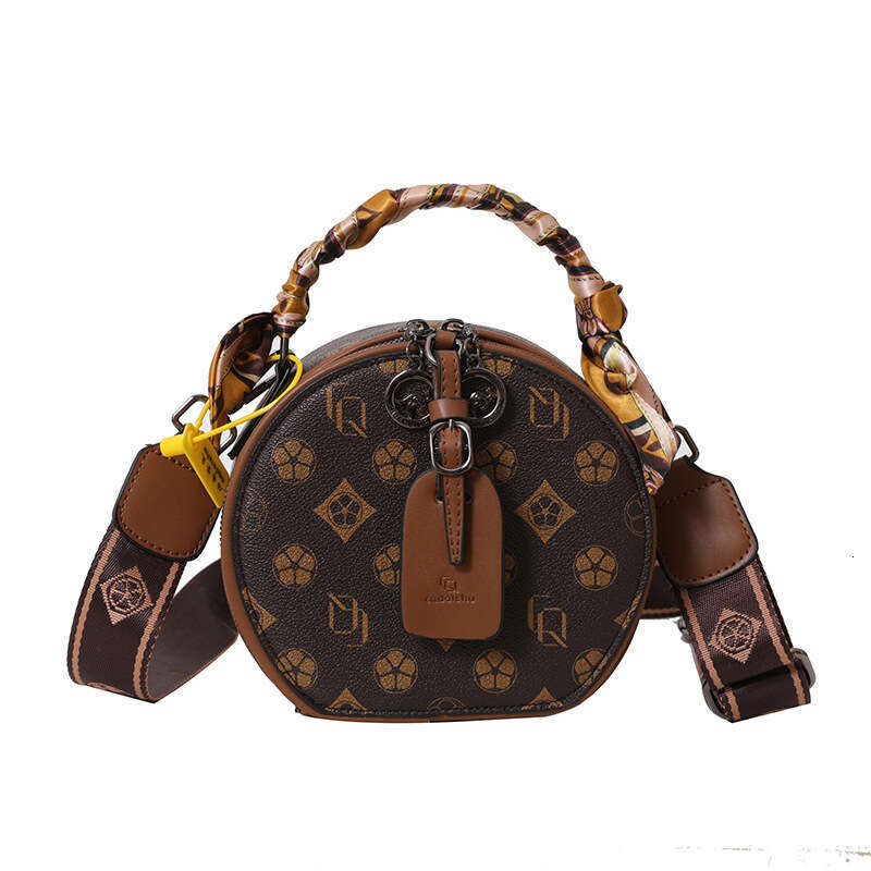 Round 2024 new high-end single shoulder French niche small crossbody biscuit bag for women