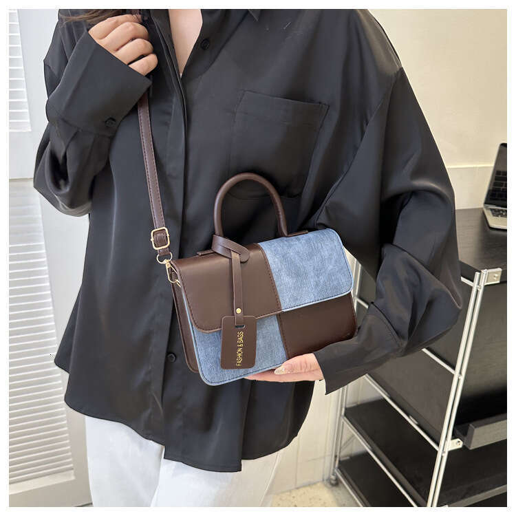 Niche design color blocking splicing hand-held small square 2023 new texture crossbody fashion shoulder bag