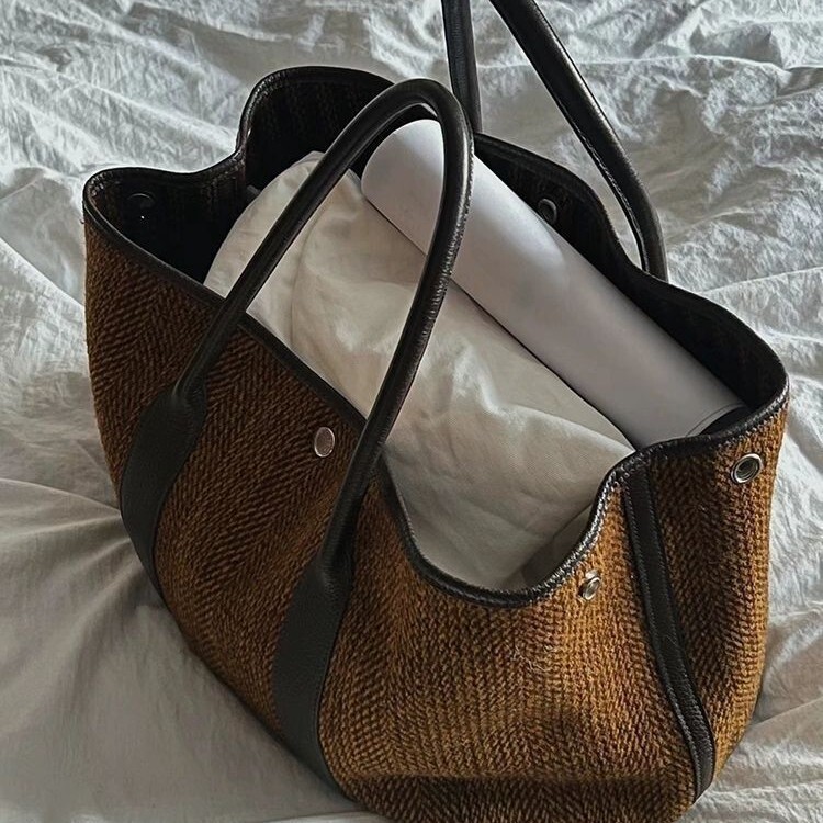 2025 designer niche autumn and winter new women fashion temperament woolen shoulder handbag large simple bag versatile backpack