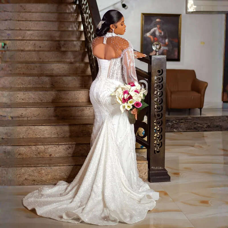 Urious Plus Size Aso Ebi Wedding Dresses Mermaid High Neck Long Sleeves Elegant Bridal Gowns African Black Women Lace Dress For Brides Illusion Gown 0