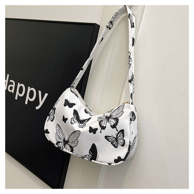 Small women 2024 new printed canvas fashion Korean version shoulder women's armpit bag