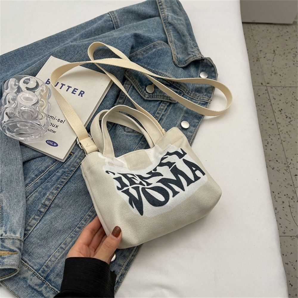 New Women's Slant Shoulder Fashion Personalized Letter Painted Canvas Designer Women's Makeup Mouth Red Envelope Large Capacity Trendy Handb