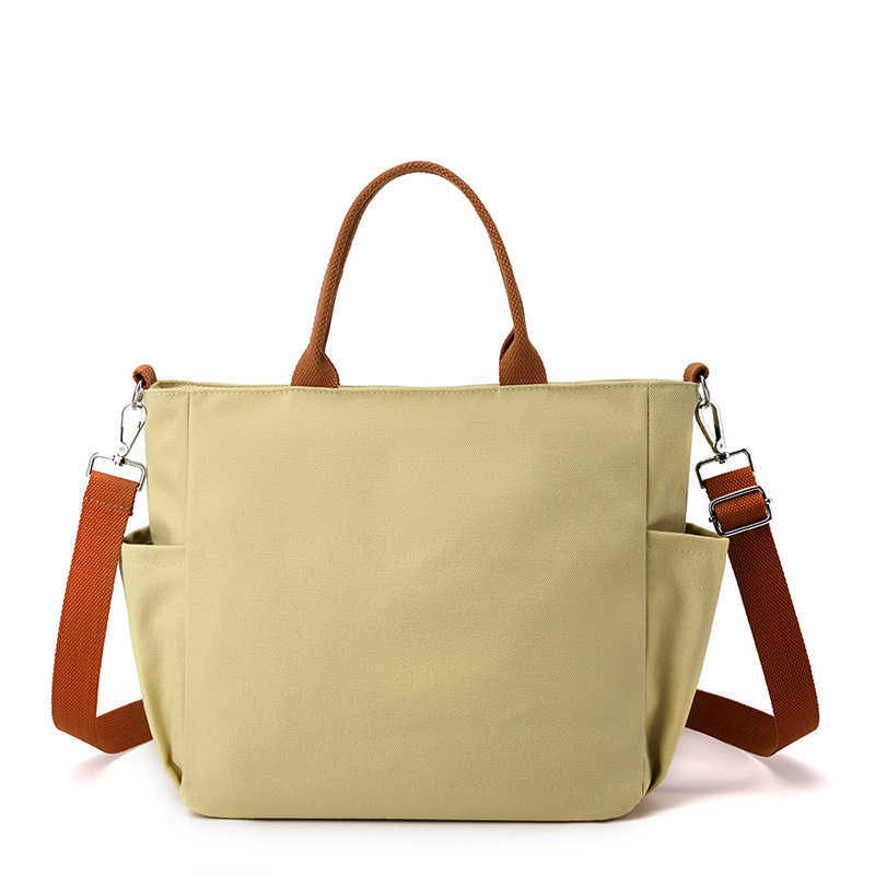 shoulder bag women's bag trend versatile, simple fashionable Korean version large capacity handheld college sail cloth bag 241215