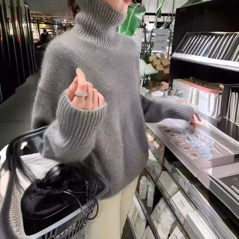 lazy high neck knitted for women in autumn winter, soft and sticky solid color, loose fitting interior, Korean style women's sweater