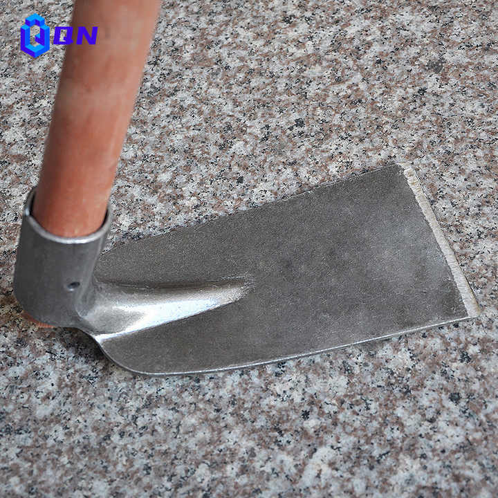 outdoor wooden handle hoe to loosen the soil to open up the land home planting vegetables weeding track hoe