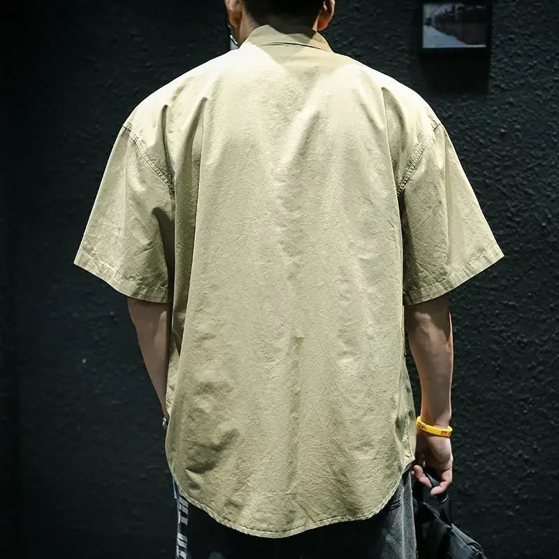 Mens short sleeved product with pocket shirt suitable for mens summer s Korean style fashionable Asian ordinary cotton top 241209