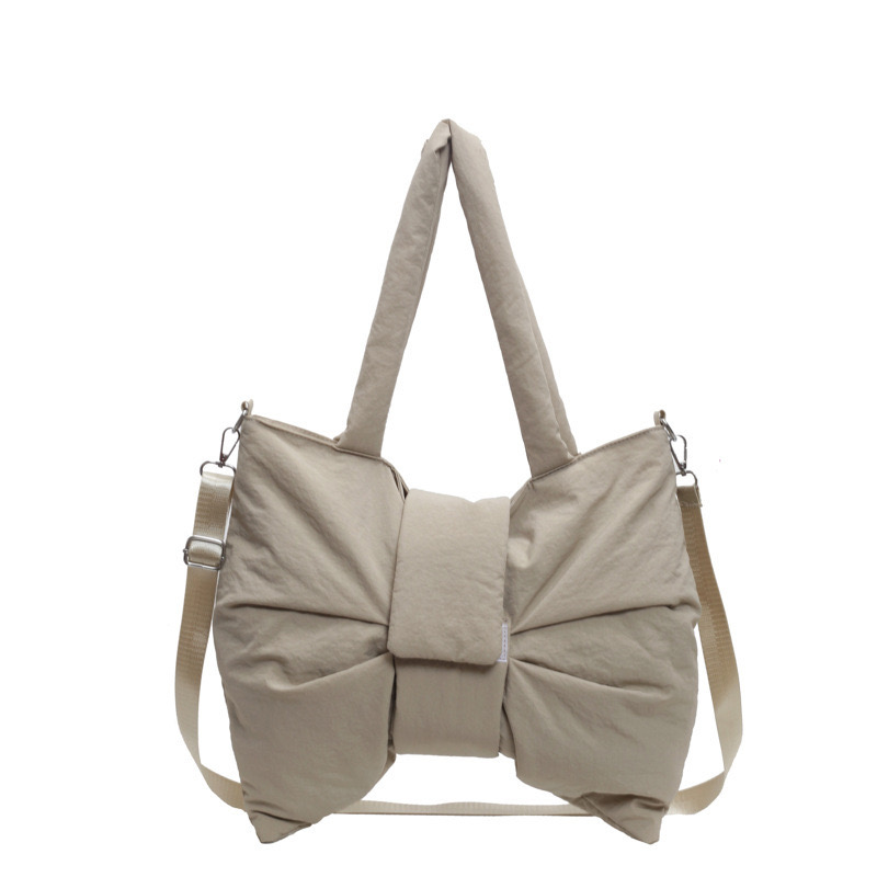 2025 new new minimalist canvas one shoulder bag, cute and exquisite bow tie, niche crossbody commuting tote bag zhanyishengli