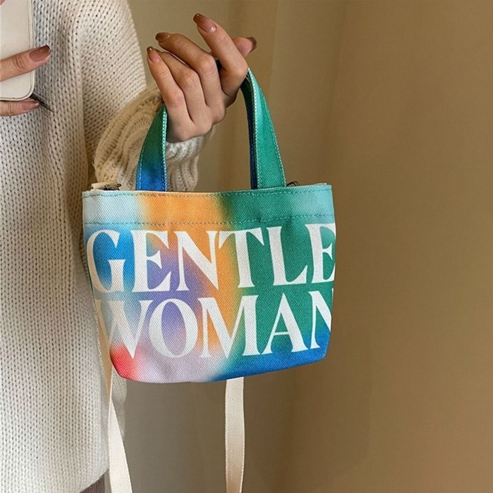 New Women's Slant Shoulder Fashion Personalized Letter Painted Canvas Designer Women's Makeup Mouth Red Envelope Large Capacity Trendy Handb