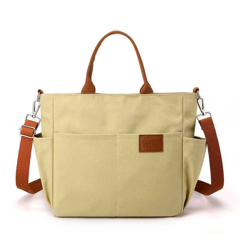 shoulder bag women's bag trend versatile, simple fashionable Korean version large capacity handheld college sail cloth bag 241215