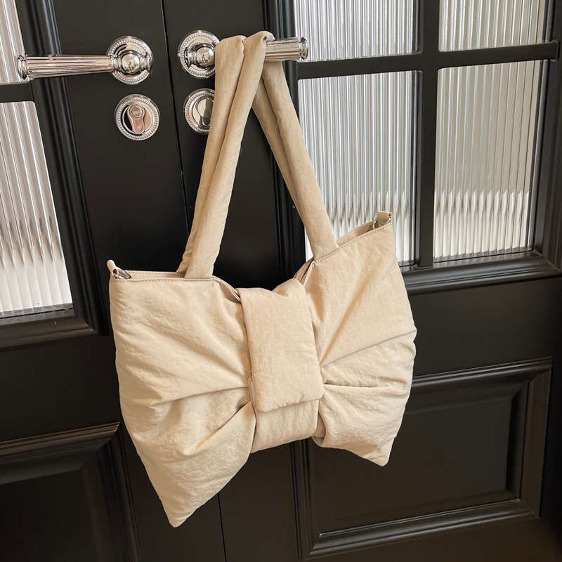 2025 new new minimalist canvas one shoulder bag, cute and exquisite bow tie, niche crossbody commuting tote bag zhanyishengli