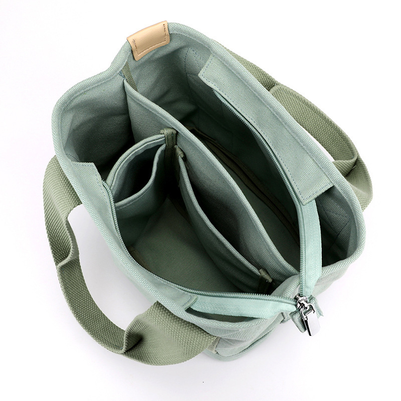 New Women s Small Zipper Fashion Designer Women s One Shoulder Portable Thick Canvas Phone Bucket Handbag Trendy Bag bag